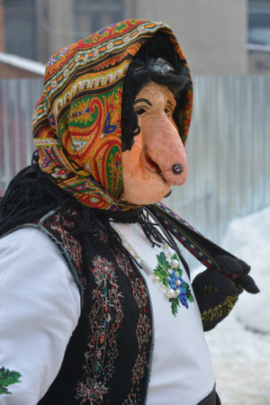 Vashkivtsi, Chernivtsi Oblast, Ukraine - 14.01.2013: Malanka celebration. Man in a festive costume...