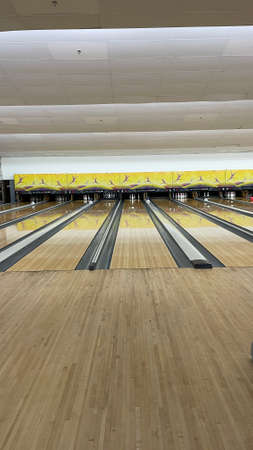 Bowling time with friends in small cityの写真素材