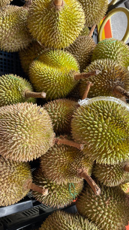 High angle view of durian for sale at market stall