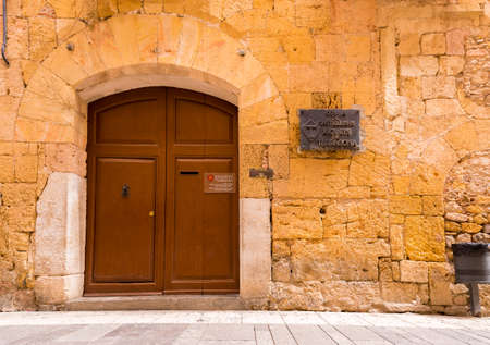 TARRAGONA, SPAIN - MAY 1, 2017: The door of Colla de Castellers Xiquets de Tarragona. Copy space....