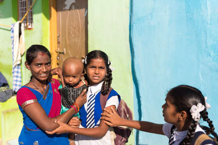 PUTTAPARTHI, ANDHRA PRADESH - INDIA - NOVEMBER 09, 2016: Indian children on the street. Copy space