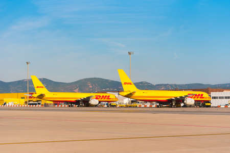 BARCELONA, SPAIN - AUGUST 20, 2016: Yellow cargo planes Boeing 757 from the logistics courier...