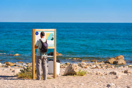 MIAMI PLATJA, SPAIN - APRIL 24, 2017: Tourist on the beach. Space for text. Copy spaceのeditorial素材
