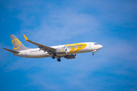 BARCELONA, SPAIN - AUGUST 20, 2016: Airplane Primera is flying over Barcelona. Blue skyのeditorial素材