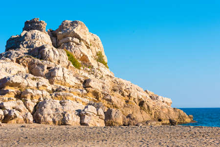 Rocky hill on the beach in Barcelona, Catalunya, Spain. Space for textの写真素材