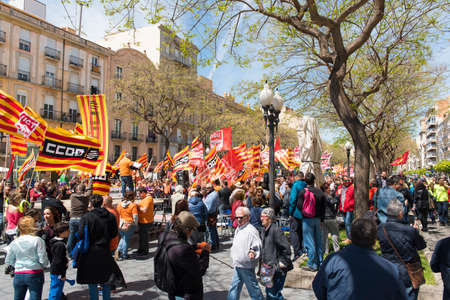 Tarragona, Spain - 01, 05, 2017: People with flags at the street of Tarragona at the 1st of may, international celebrationのeditorial素材