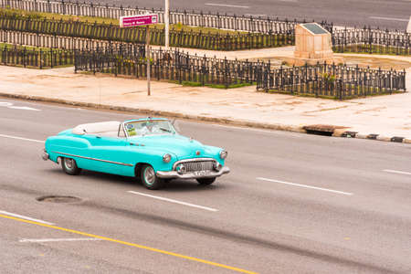 CUBA, HAVANA - MAY 5, 2017: American azure retro cabriolet on city street. Copy space for textのeditorial素材