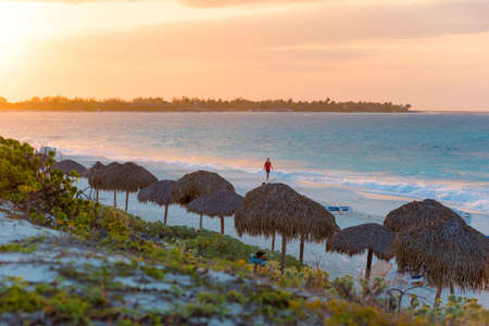 Sunrise on the sandy beach of island of Cayo Largo, Cuba. Copy space for textのeditorial素材
