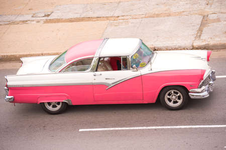 CUBA, HAVANA - MAY 5, 2017: American retro car on city street. Copy space for textのeditorial素材