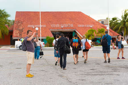 CAYO LARGO, CUBA - MAY 10, 2017: Tourists at the airport. Copy space for textのeditorial素材