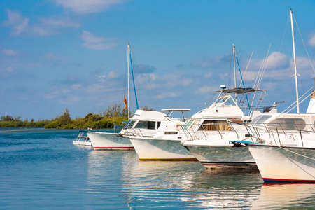 CAYO LARGO, CUBA - MAY 10, 2017: White yachts near the shore. Copy space for textのeditorial素材