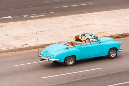 CUBA, HAVANA - MAY 5, 2017: American azure retro cabriolet on city street. Copy space for textのeditorial素材