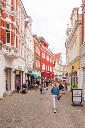 OLDENBURG, GERMANY - JUNE 10, 2017: View of the old town street. Vertical. Copy space for text