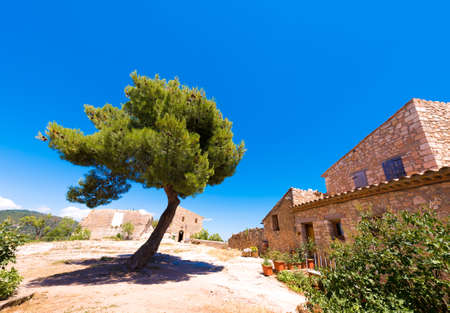 View of the buildings in the village Siurana de Prades, Tarragona, Catalunya, Spain. Copy space for textの写真素材