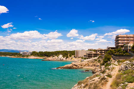 Rocky beach in Salou, Tarragona, Catalunya, Spain. Copy space for textの写真素材