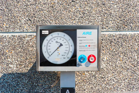 The device for inflating tires. Pressure meter. Close-up