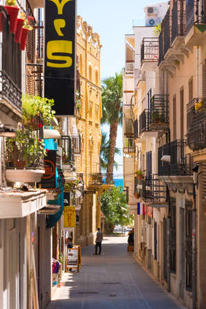 SITGES, CATALUNYA, SPAIN - JUNE 20, 2017: Little street of the historic city center. Verticalのeditorial素材
