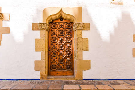 The wooden door of the museum Marisel de Mar, Sitges, Barcelona, ??Catalunya, Spain. ?opy space for textのeditorial素材