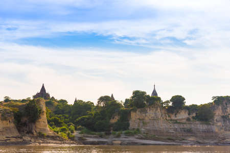 Pagoda on the bank of the Irrawaddy river, Mandalay, Myanmar, Burma. Tour from Mandalay to Bagan. Copy space for textの写真素材