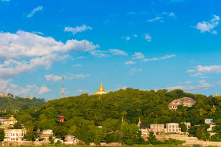 MANDALAY, MYANMAR - DECEMBER 1, 2016: Golden Pagodas in Sagaing hill, Burma. Copy space for textのeditorial素材