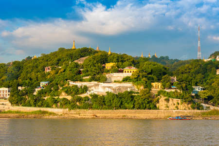 MANDALAY, MYANMAR - DECEMBER 1, 2016: Golden Pagodas in Sagaing hill, Burma. Copy space for textのeditorial素材
