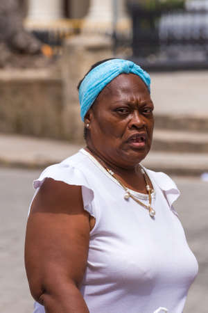 CUBA, HAVANA - MAY 5, 2017: Woman on a city streetのeditorial素材