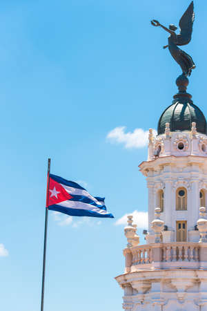 Cuban flag against the blue sky. Copy space. Verticalの写真素材