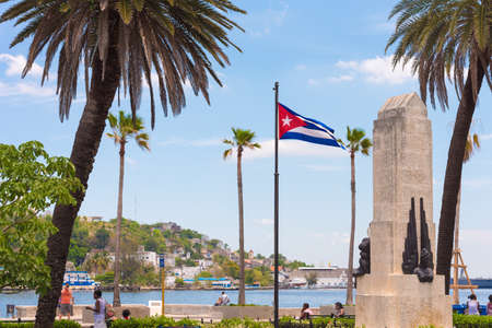 CUBA, HAVANA - MAY 5, 2017: Monument and flag on the waterfront. Copy space for textのeditorial素材