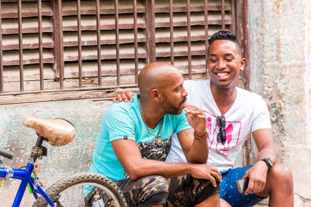 CUBA, HAVANA - MAY 5, 2017: Portrait of two Cuban men on the streetのeditorial素材
