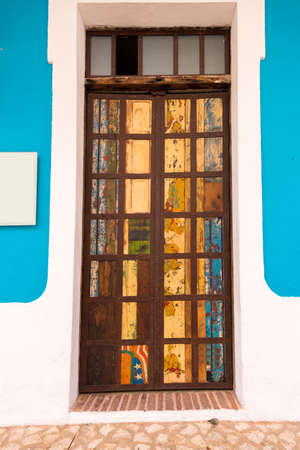 View of the bright old door, Santo Domingo, Dominican Republic. Copy space for text. Verticalの写真素材