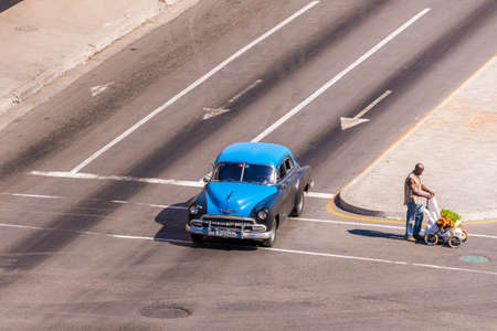 CUBA, HAVANA - MAY 5, 2017: American blue retro car on city street. Copy space for textのeditorial素材