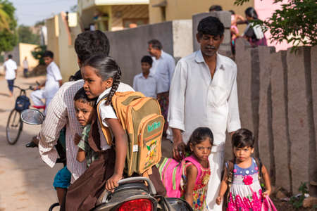 PUTTAPARTHI, ANDHRA PRADESH, INDIA - JULY 9, 2017: Children on a motorcycle. Close-upのeditorial素材