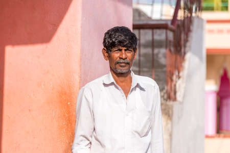 PUTTAPARTHI, ANDHRA PRADESH, INDIA - JULY 9, 2017: Portrait of an Indian man. Copy space for textのeditorial素材