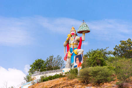 PUTTAPARTHI, ANDHRA PRADESH, INDIA - JULY 9, 2017: Hill View Stadium - Hanuman Statue. Copy space for textのeditorial素材