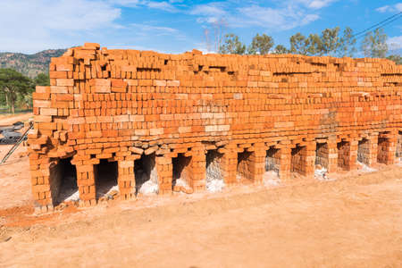 Furnace for firing indian bricks, Puttaparthi, Andhra Pradesh, India. Copy space for textの写真素材