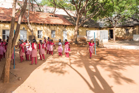 PUTTAPARTHI, ANDHRA PRADESH, INDIA - JULY 9, 2017: Group of indian schoolgirls.のeditorial素材