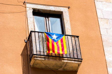 View of the balcony with a flag. Before the referendum on independence, Tarragona, Catalunya, Spain. Close-upの写真素材