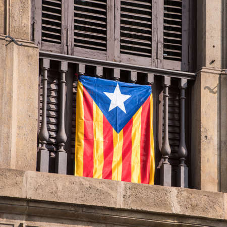 View of the balcony with a flag. Referendum on independence, Barcelona, Catalunya, Spain. Close-upの写真素材