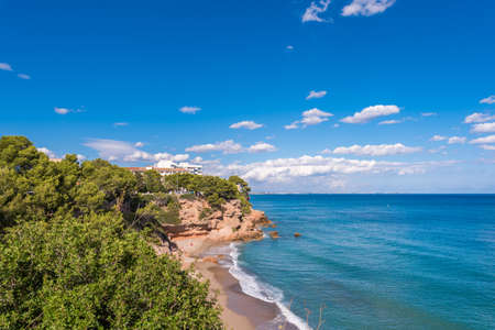 View of the coastline of the Costa Dorada in Miami Platja, Tarragona, Catalunya, Spain. Copy space for textの写真素材