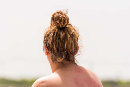 The nape of a woman close-up, Saona island, Dominican Republic. Copy space for text. Back viewの写真素材