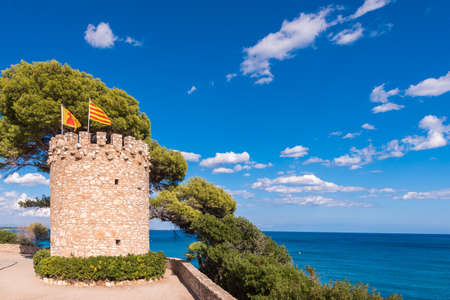 Observation tower on the rock in Miami Platja, Tarragona, Catalunya, Spain. Copy space for text