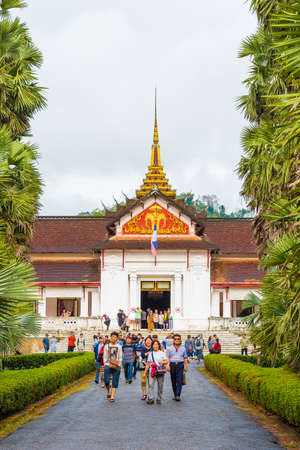 LOUANGPHABANG, LAOS - JANUARY 11, 2017: View of the building of the buddhist temple. Vertical. Copy space for textのeditorial素材