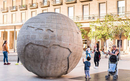 SARAGOSSA, SPAIN - SEPTEMBER 27, 2017: Enormous globe on an area Plaza del Pilar in a historical center. Copy space for textのeditorial素材