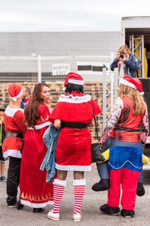 AGDE, FRANCE - SEPTEMBER 9, 2017: New Year's masquerade at the exhibition of retro cars Volkswagen. Copy space for text. Verticalのeditorial素材