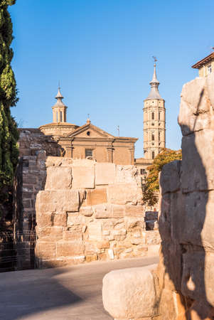 Roman walls in the background of the church Iglesia de San Juan de los Panetes, Zaragoza, Spain. Copy space for text. Verticalの写真素材