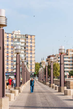 SARAGOSSA, SPAIN - SEPTEMBER 27, 2017: Bridge over the Ebro River. Copy space for text. Verticalのeditorial素材