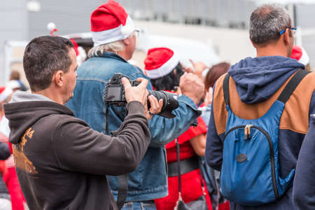 AGDE, FRANCE - SEPTEMBER 9, 2017: Photographer at the exhibition of retro cars Volkswagen. Close-upのeditorial素材