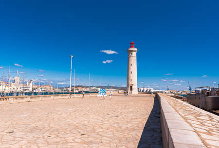 SETE, FRANCE - SEPTEMBER 10, 2017: Stunning harbour of Sete with lighthouse in the south of France near the Mediterranean. Copy space for textのeditorial素材