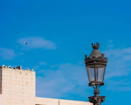 BARCELONA, SPAIN - OCTOBER 3, 2017: View of a street lamp against a blue sky. Copy space for textのeditorial素材