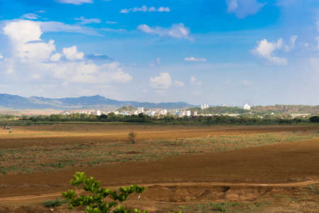 View of the indian rural landscape, Puttaparthi, Andhra Pradesh, India. Copy space for textの写真素材